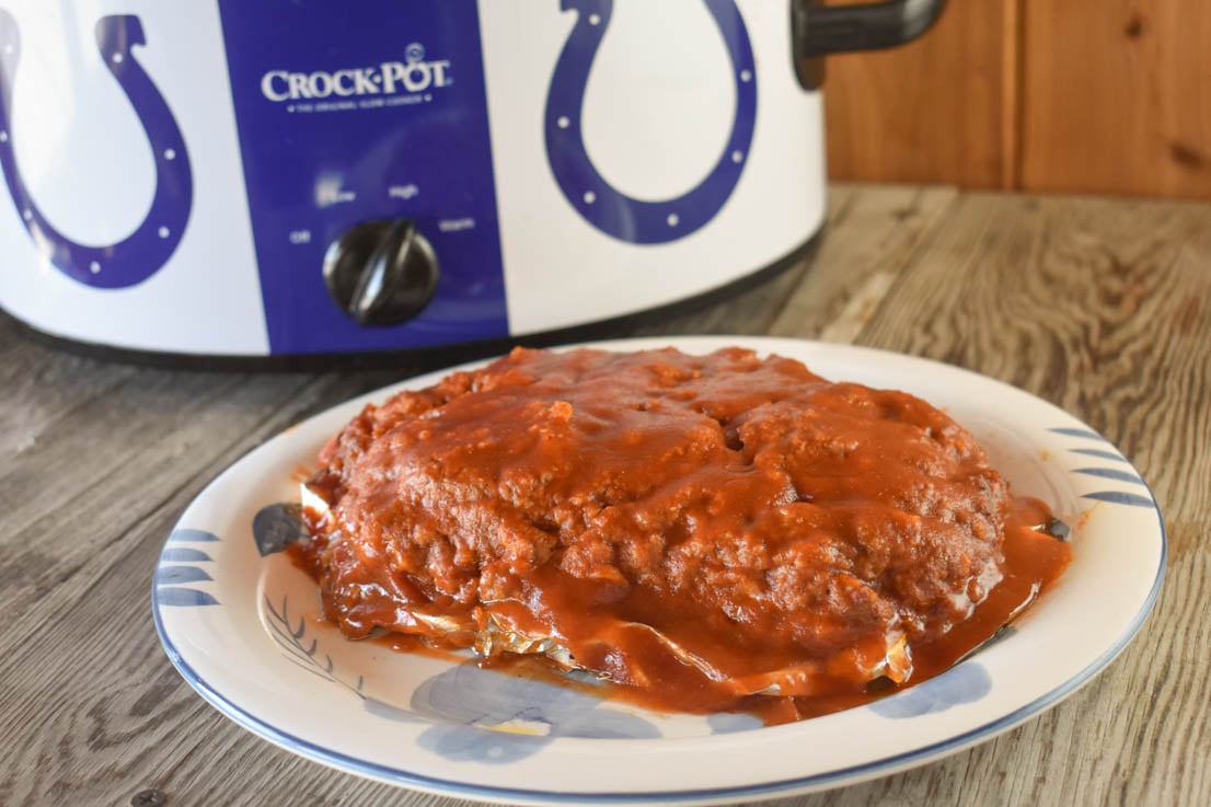 This Crock Pot Enchilada Meatloaf is just the right combination of Mexican flavors and a classic American dish.