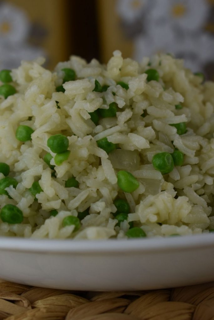 Many of these old-fashioned recipes have few ingredients that are pantry staples, and that is exactly why I fell in love with Easy Rice Pilaf with Green Peas. This simple recipe only has 5 ingredients that I almost always have all of these on hand.