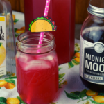 Hard Blackberry Lemonade is a 2-ingredient cocktail that will soon become your go-to summer drink.  Simply Lemonade is jazzed up with Blackberry Moonshine for the best-ever hard lemonade recipe.