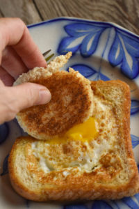 Egg in a Basket is a simple, yet delicious breakfast dish that you can have on the table in less than 10 minutes. A variation of the classic British dish - toad in the hole - this one features just toast and a runny fried egg.