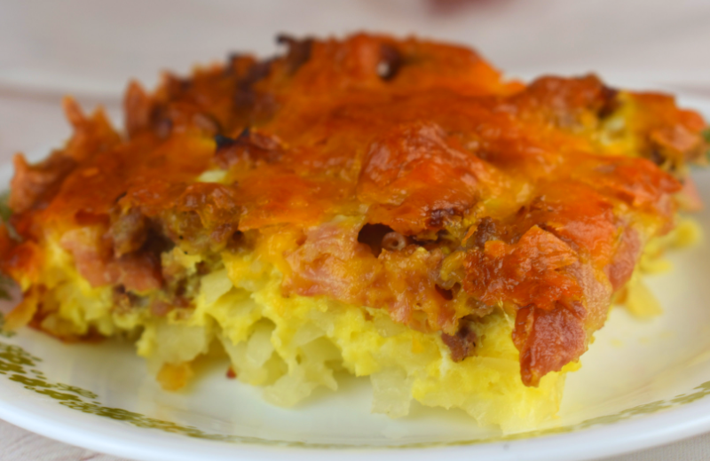 Loaded Breakfast Casserole has all the parts of your favorite breakfast wrapped into one decked out casserole---hash browns, eggs, cheese, sausage, bacon and ham.  This recipe serves a crowd making it perfect for your next holiday brunch.