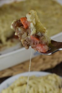 French Onion Shepherd's Pie is a new spin on an old family favorite. It takes the classic ground beef shepherd's pie and jazzes it up with condensed French onion soup.  The results is a savory, delicious dinner the whole family will love.