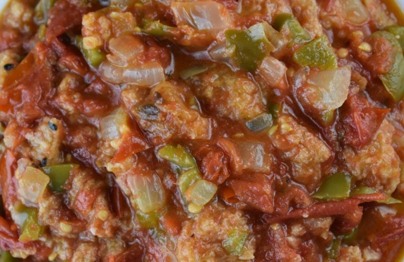 Old Fashioned Stewed Tomatoes are a treat for your taste buds.  Sweet garden tomatoes are cooked slowly with onions, green peppers and butter to form a rich sauce which is soaked up with chunks of bread.  This is the perfect accompaniment for any summer meal. 