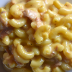 Tuna Macaroni and Cheese is a quick, stove top dinner that can be made from pantry staples.  The extra cheesy tuna mac goodness will satisfy everyone in your house.