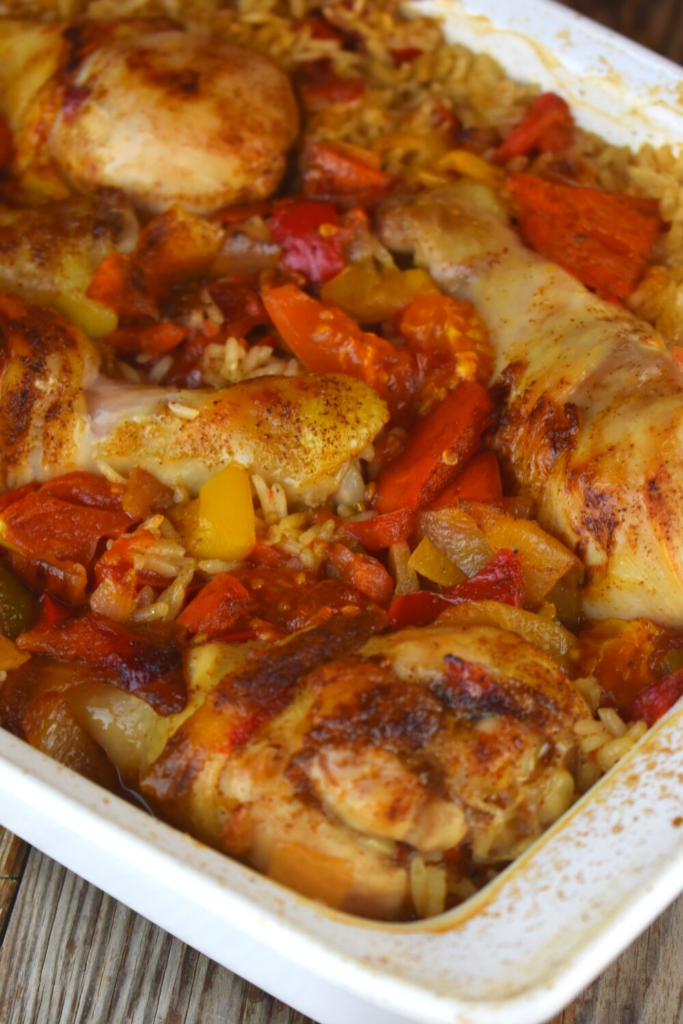 This Spanish Chicken and Rice recipe contains peppers and tomatoes, and we seasoned it with chili powder for some mild spice. This one dish dinner will be a new favorite in your weeknight rotation.