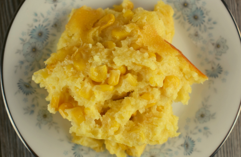 Sweet Corn Casserole is a classic side dish recipe that the entire family will love.  Jiffy Cornbread mix is the base of this creamy casserole, and the addition of honey takes this tasty dish from good to great.  