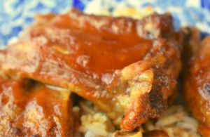Mom's Oven Baked Pork Rib follows a parboil and bake technique that results in a quick, tender barbecued pork rib.  I recommend serving over rice to absorb the finger-licking good sauce.