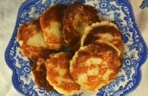 Five ingredients is all it takes to make Granny's Leftover Mashed Potato Cakes.  Using a base of your favorite leftover real mashed potatoes. you can easily make this economical side dish that the whole family will love. 