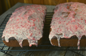 Strawberry Bread with Frozen Strawberries is an easy quick bread with incredible strawberry flavor. The thawed strawberries give it a moist texture, and the easy strawberry glaze is a sweet and flavorful. You'll want to eat this for breakfast, dessert and every meal in between. 