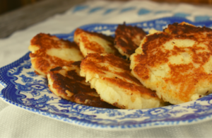 Five ingredients is all it takes to make Granny's Leftover Mashed Potato Cakes.  Using a base of your favorite leftover real mashed potatoes. you can easily make this economical side dish that the whole family will love. 