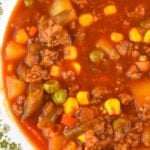 With 5 simple ingredients, you can have a warm, hearty, family-pleasing soup on the table.  Hamburger Vegetable Soup with V8 Juice is the perfect meal for hungry kids and adults. Using a bottle of V8 and a bag of frozen vegetables makes this meal totally doable for a busy weeknight.