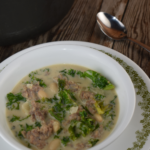 Tuscan Soup with Kale and Sausage is hearty soup that can be served up in thirty minutes. This recipe features pork sausage, cannellini beans, and kale with a creamy broth made with a combination of chicken broth and evaporated milk.