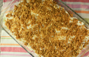 No Bake Apple Cheesecake Salad is a six layer, no bake dessert that features a list of the best dessert ingredients: peanut butter, graham crackers, apple pie filling, whipped topping, and cream cheese.  This easy fluff recipe will be a hit at your next party or get-together. 