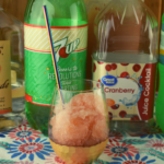 Looking for a party cocktail recipe? This large quantity Sneak Pete Drink is just the solution. It's sweet and slushy and serves a crowd. Make it ahead, and store in the freezer for your next party.