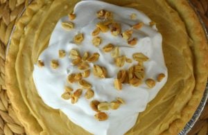 Old Fashioned Peanut Butter Pie is a from scratch pudding pie that has a decadent peanut butter flavor and smooth, creamy texture.  Homemade peanut butter pie from scratch is easy as pie. You may never buy a boxed pudding mix again after making this easy pudding filling.