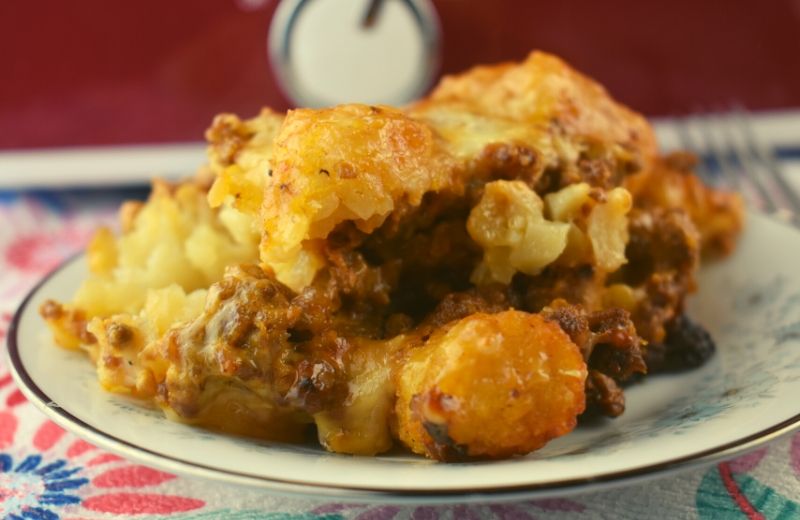 Crock Pot Frisco Melt Tater Tot Casserole is a play on the Steak N Shake Frisco Melt with a saucy sweet base and loads of cheese.
