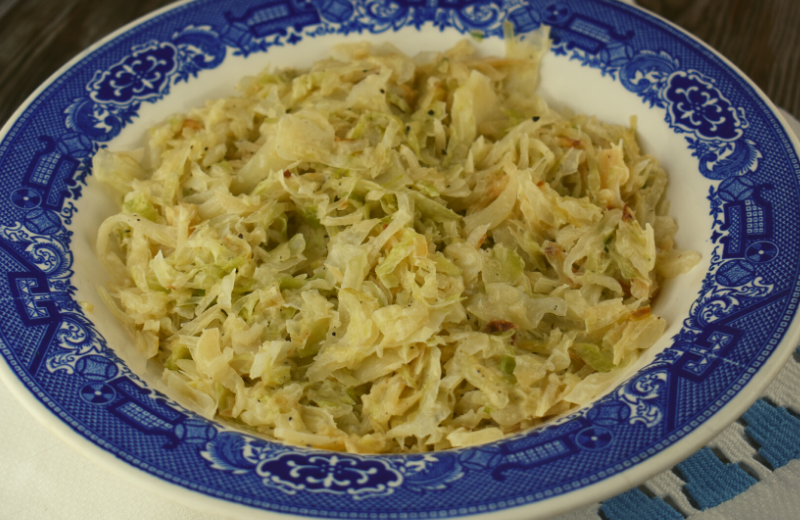 Looking for a new favorite side dish? Try Creamy Cabbage with only 5 Ingredients.  Shredded cabbage is sauteed in butter, and then a creamy sauce is made with heavy cream, salt and pepper.  It's easy, and it's delicious.  