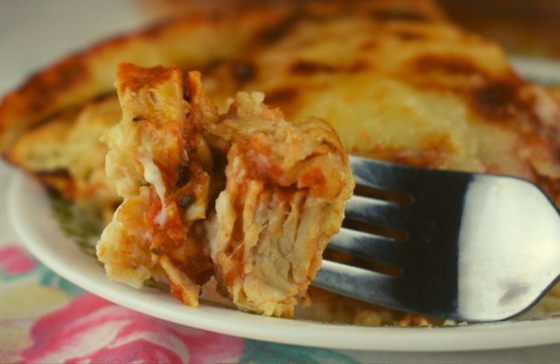 Impossible Chicken Parmesan Pie is impossibly easy to throw together for a quick weeknight meal.  Three layers of cheesy goodness combine to form a pizza pie that the whole family will love.