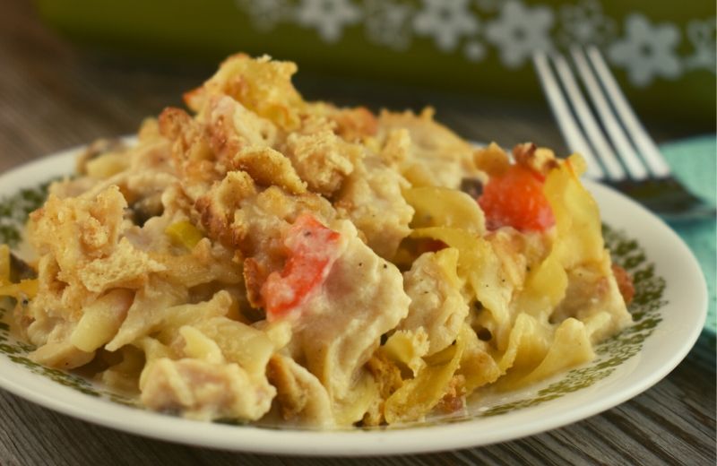 Our version of homemade Chicken Tetrazzini Casserole is without canned soup, sour cream and cream.  Instead, the cheesy sauce is made from milk, chicken broth, and shredded Parmesan.  I guess you could say this is just like Grandma would make back in her day.