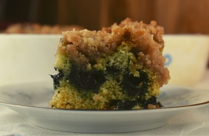 This Blueberry Coffee Cake is an old fashioned recipe that features a lightly sweetened blueberry cake with an over the top streusel topping made with butter, sugar, flour and cinnamon. 