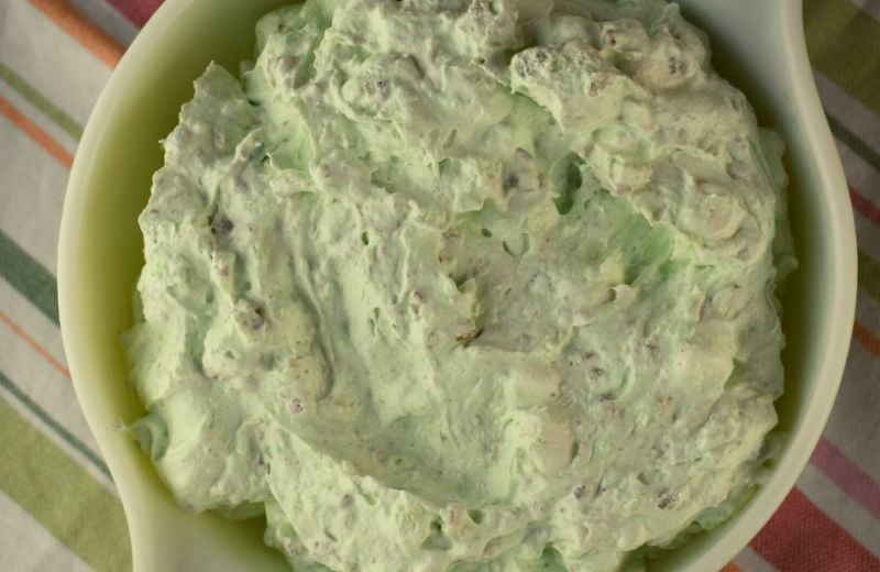 Watergate Salad (also known as Pistachio Fluff) is a delightful, vintage salad packed with Pistachio flavor.  With only 5 simple ingredients, this fluffy treat will quickly become a most-requested recipe. 