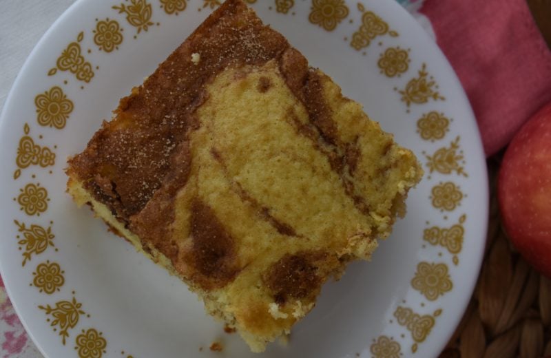 Cake Mix Applesauce Cake is an easy dessert with only 6 ingredients.  Adding applesauce to a boxed yellow cake mix results in a light, moist coffee cake that is irresistible to the young and old alike.