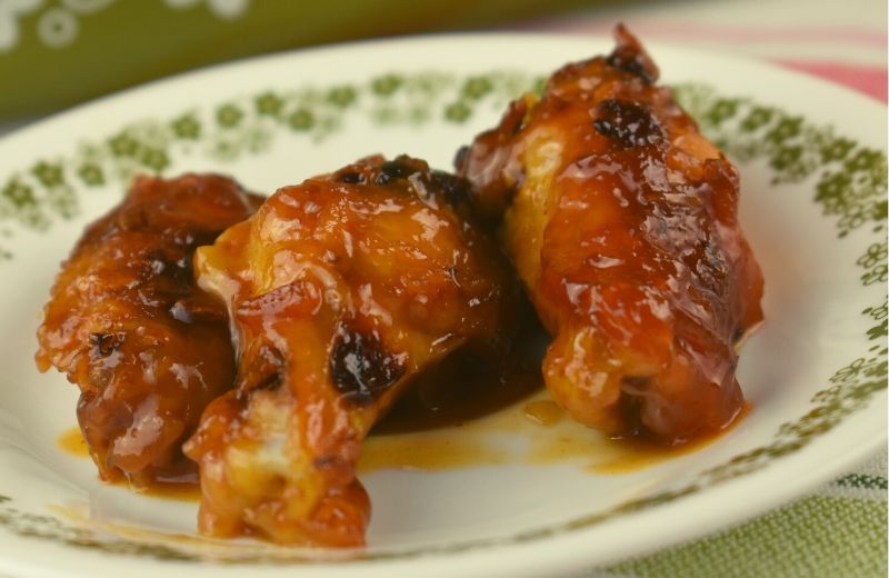 Hawaiian Glazed Chicken is an easy oven-baked recipe using minimal ingredients.  Use this sweet, sticky sauce on chicken wings or legs for a family-pleasing meal. 