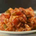 Our Jambalaya with Ham is the perfect leftover ham recipe after the holidays.  This quick jambalaya is a one pan version that comes together in 30 minutes.  