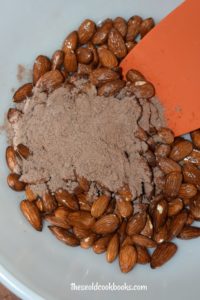 Looking for a protein-packed snack that follows a clean eating diet? Cocoa Dusted Almonds with Protein Powder will remind you of your favorite snack without the added sugar. When the hunger-pain hits, grab a handful of these healthy treats. 