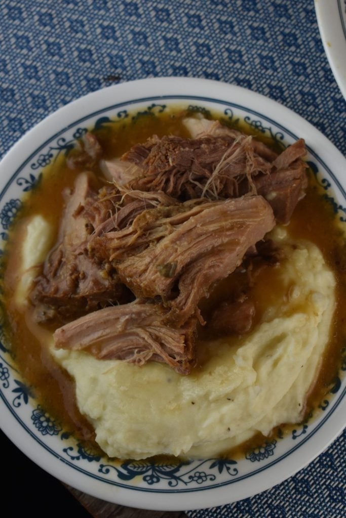 This easy slow cooker pork roast forms a delicious gravy that goes well seved over mashed potatoes.