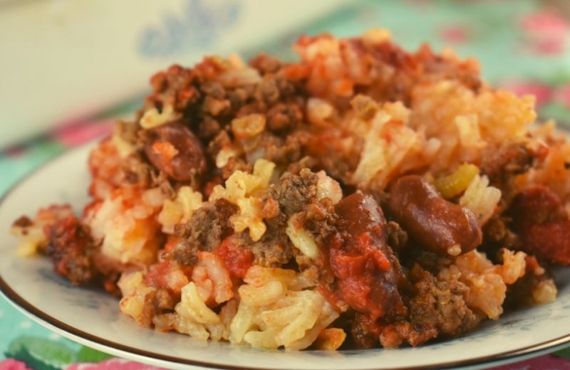 Got picky kids? I've got a new meal just for you. Hamburger Hot Dish with Rice is an easy casserole that my kids love, and yours will too.  Featuring ground beef, rice, and kidney beans in a base of tomato sauce, you may already have all the ingredients on hand. 