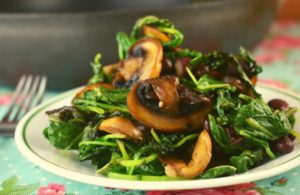 Sauteed Baby Kale and Mushrooms is packed with flavor and nutritious ingredients. Mushrooms sauteed in olive oil perfectly compliment wilted baby kale with a surprise addition of kidney beans for added protein. Serve this along side grilled chicken or make it meatless by eating it over a cooked sweet potato or quinoa. 