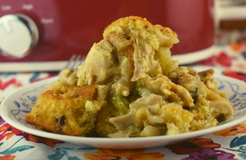 Be prepared to add Crockpot Chicken Cornbread Stuffing Casserole to your regular rotation of dinners.  It tastes like the best of Thanksgiving dinner wrapped up into one easy meal. I promise your family will lick their plates clean and beg for more!