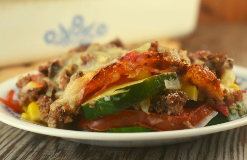 Zucchini Tomato Casserole with Ground Beef is a simple summer garden vegetable bake that is light and fresh without a heavy sauce to weigh you down. Our version features zucchini, onion, corn and tomatoes, but yours can be individualized to your own personal taste. 