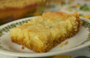 There's only six ingredients between you and a pan of Lemon Cake Mix Gooey Bars.  This rich butter cake is simple to make using a boxed cake mix base, yet the outcome is something worthy of a Grand Prize. 