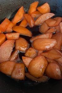 My kids love these rosy red Cinnamon Stewed Apples for breakfast, lunch or dinner.  Made with apples sugar, water and cinnamon and cooked on the stove-top in a matter of minutes, you'll find yourself adding these to your weekly menu rotation.