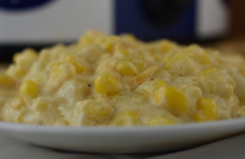 Crock Pot Cheesy Creamed Corn is a dump and go slow cooker side dish. Cream cheese corn feeds a crowd and has them begging for more.