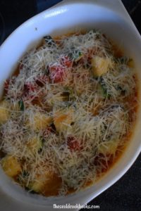 Healthy Zucchini Tomato Casserole includes a menagerie of fresh garden veggies sauteed together. Before serving, a layer of shredded Parmesan cheese is melted over top for the perfect finishing touch. 