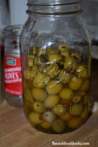 Once you start making these Homemade Martini Olives, there's no stopping.  Whether you're having a party with friends or making a party appetizer, these cocktail olives are a tasty treat.  Plus, they make the perfect gift for any martini enthusiast.
