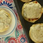 Some nights, you need a no-fuss dinner that comes together in a pinch.  Quick and Easy Pizza Buns can be made in a matter of minutes or can be made ahead and put in the oven frozen.