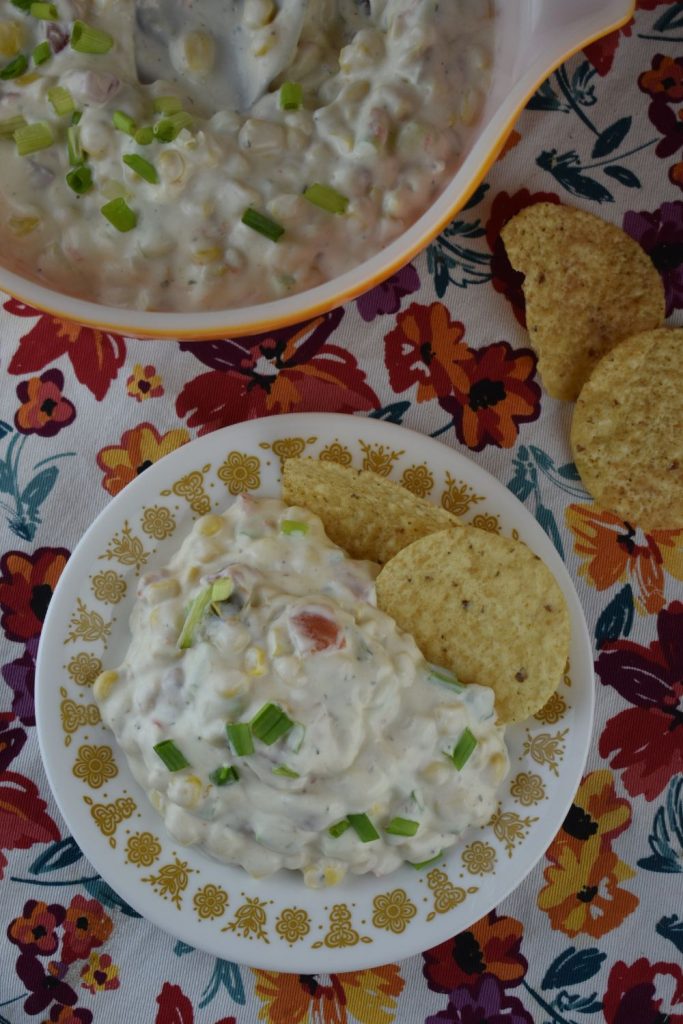 This dip featuring Mexicorn is a perfect appetizer with tortilla chips.