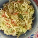 This homemade coleslaw dressing recipe is easy as can be with only four ingredients plus salt and pepper. Simple and Sweet Coleslaw goes together in a pinch for the perfect side dish.