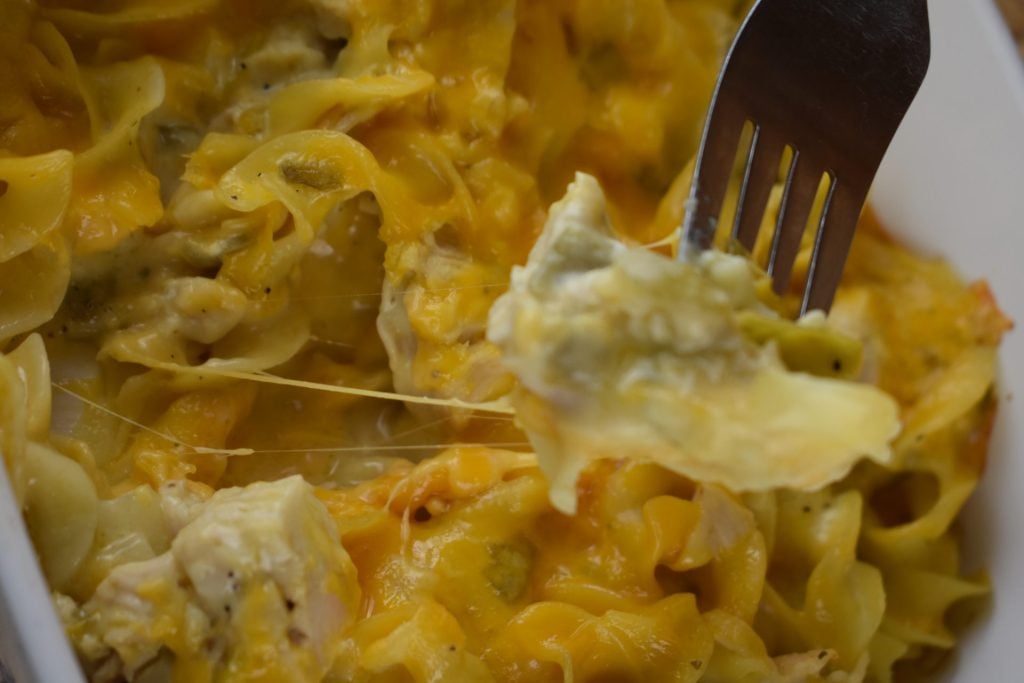 This chicken casserole with green chiles is a cheesy noodle dish and can be made with diced, shredded and even canned chicken.