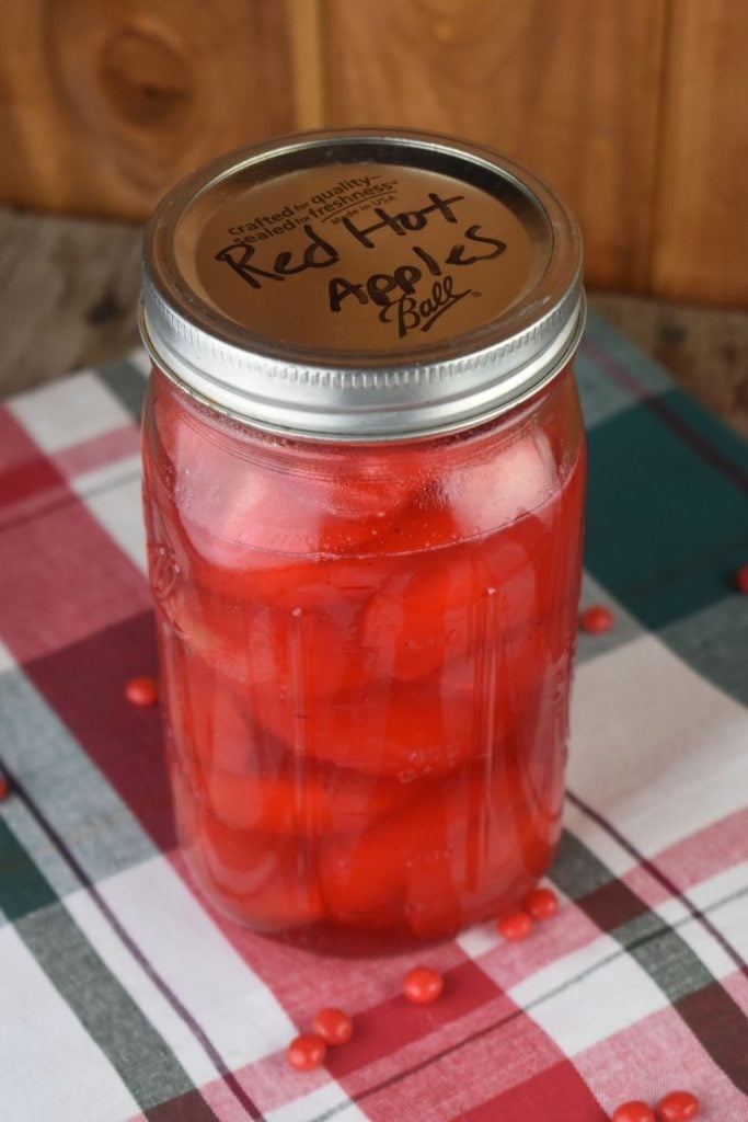 Store these red hot cinnamon apples in a mason jar or any airtight container in the refrigerator.