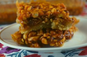 Looking for a recipe with mixed nuts? Ooey Gooey Mixed Nut Bars are a salty and sweet cookie bar that will satisfy both cravings.  