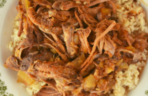 Crock Pot Tropical Pork Roast is a simple Hawaiian spin on tender, flavorful shredded pork.  Use your slow cooker to conquer this Pork Roast with Pineapple, and serve over rice or as a sweet pulled pork sandwich.