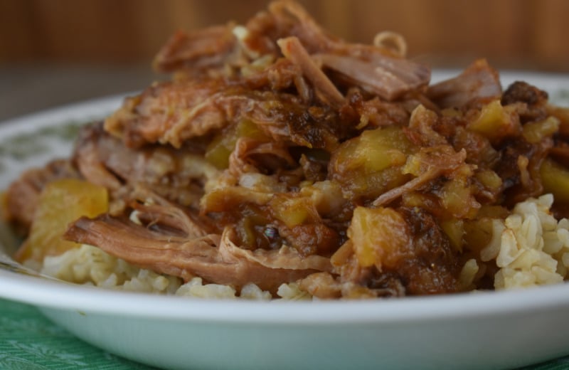 Crock Pot Tropical Pork Roast is a simple Hawaiian spin on tender, flavorful shredded pork.  Use your slow cooker to conquer this Pork Roast with Pineapple, and serve over rice or as a sweet pulled pork sandwich.