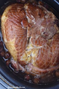 Crock Pot Cherry Ham is double the cherry flavor with an easy cherry glaze made of Cherry Pie Filling, Cherry Cola and brown sugar.  Don't forget to turn on the Crock Pot, and in 6 short hours, you'll have a sweet ham fit for any holiday.