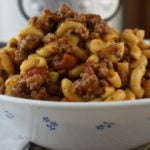 Instant Pot American Goulash (Instant Pot Chop Suey Recipe) updates our classic ground beef goulash into a quick pressure-cooker recipe.  Using hamburger and elbow macaroni, this goulash recipe is a cult favorite with kids. 