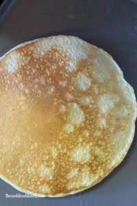 Cottage Cheese Pancakes use 4 ingredients to make a thin pancake perfect to be topped, rolled, folded or filled. Cottage cheese, eggs, Bisquick and milk are blended up for a high-protein breakfast. 
